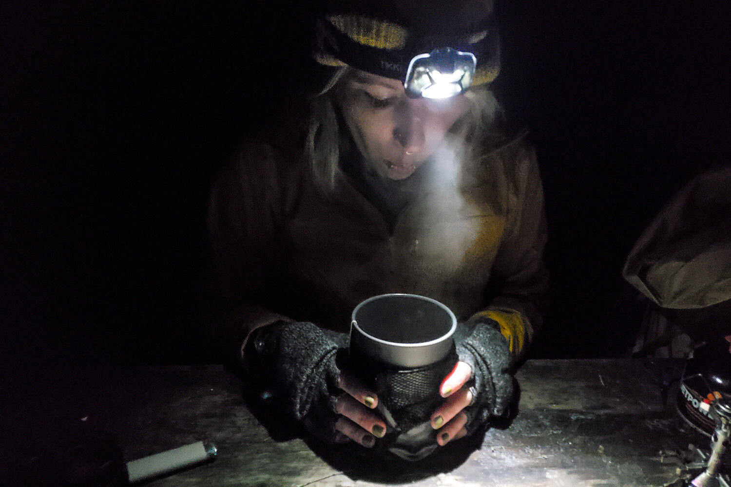The Petzl Tikkina is our favorite budget headlamp. It puts out plenty of light for tasks around camp.
