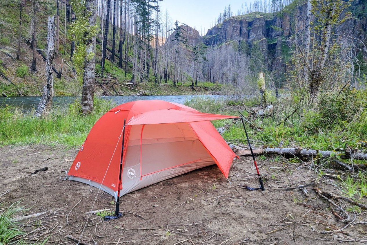 The Big Agnes Copper Spur HV UL3 Backpacking Tent pitched near a river in Oregon.