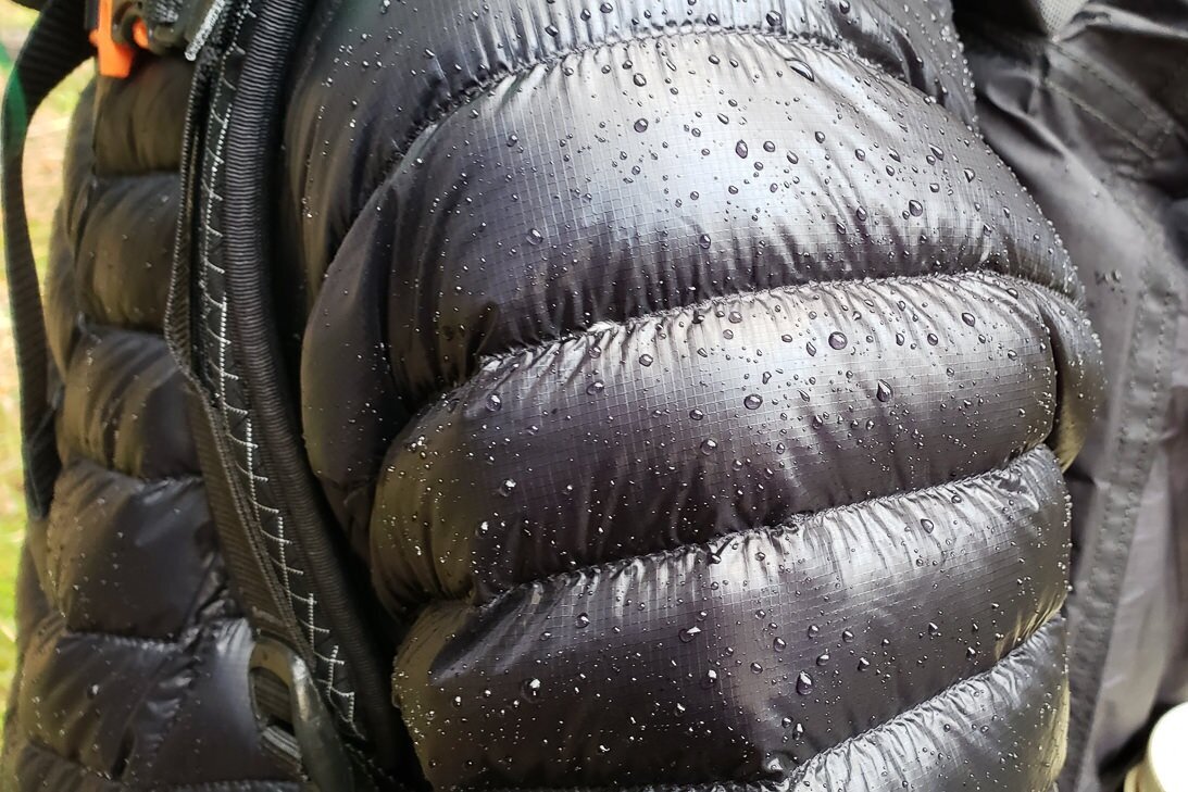 Many down jackets, like the Mountain Hardwear Ghost Whisperer/2, have a DWR coating to shed light rain