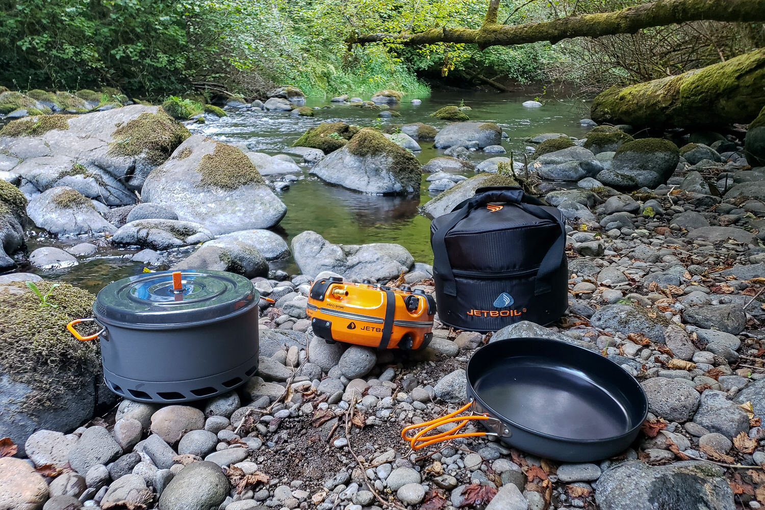 The Jetboil Genesis Basecamp System features large-volume cookware & a super compact stove that nests inside