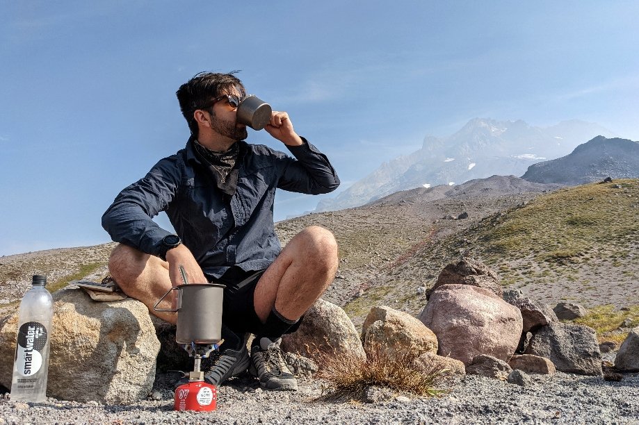 A backpacker using the Snow Peak Mini Solo Cookset on the Timberline Trail