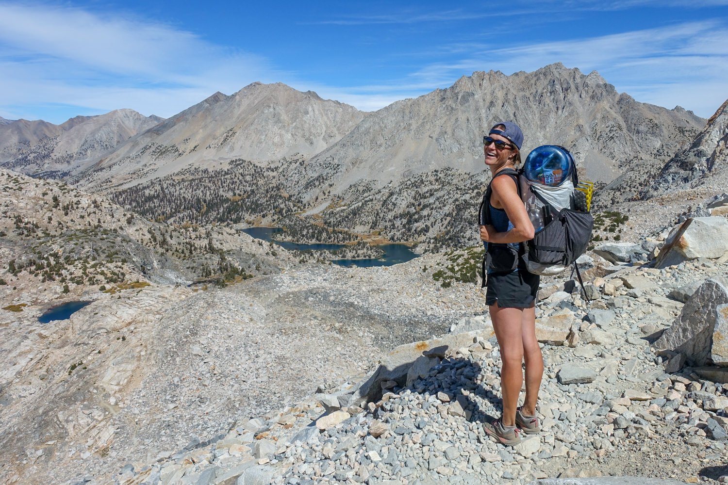 A backpacker carrying the HMG Southwest Backpacking Pack