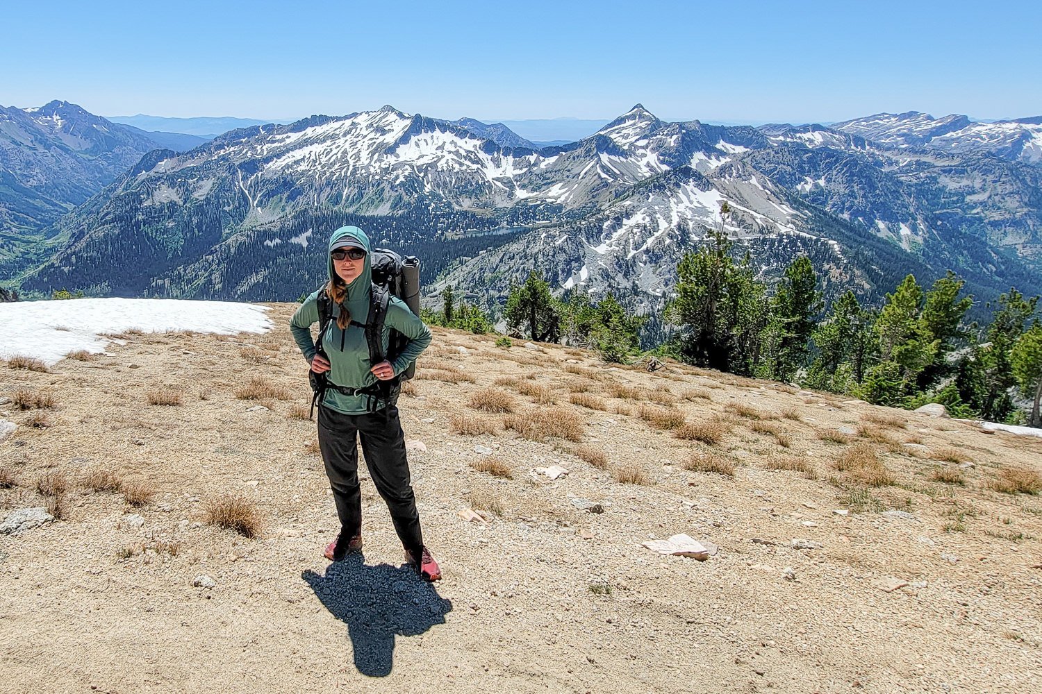 A backpacker wearing the Outdoor Research Echo in the Eagle Cap Wilderness