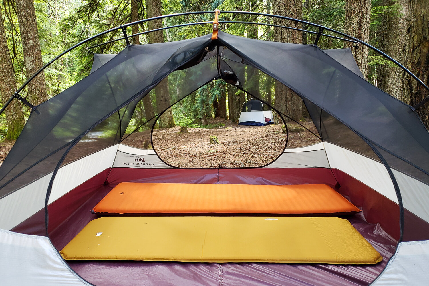 The REI Camp Bed and Groundbreaker sleeping pads are compact and affordable