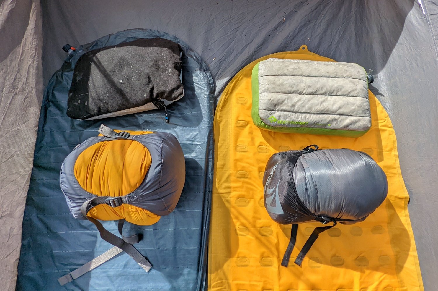sleep systems set up inside a tent