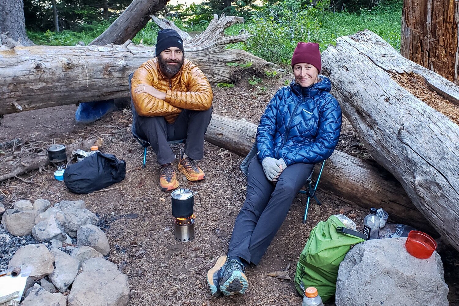 The ultralight Men’s Mountain Hardwear Ghost Whisperer/2 and the women’s Montbell Plasma 1000 Alpine Parka on a summer backpacking trip in Badger Creek Wilderness.